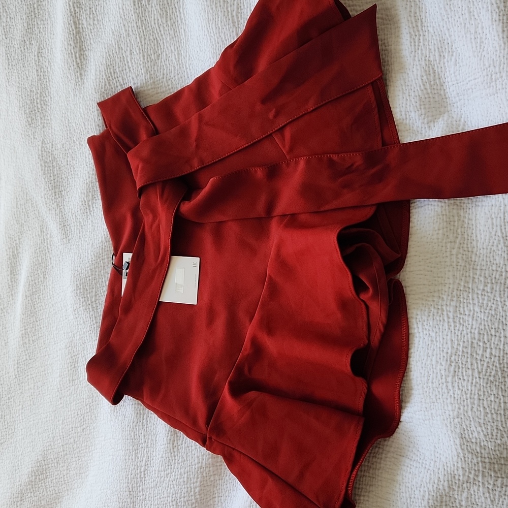 red skort with ruffle and tie detailing